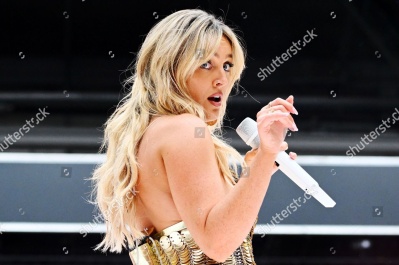 https___www_shutterstock_com_editorial_image-editorial_M3T4Q52cO2D6Ie13NzY4Njg3D_perrie-performing-on-stage-capital_s-summertime-ball-1500w-14543385ap.jpg