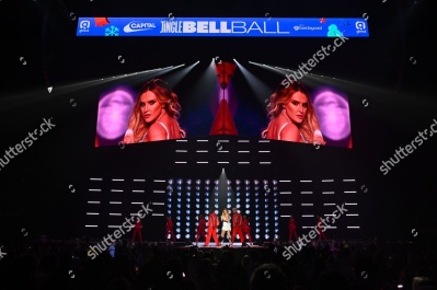https___www_shutterstock_com_editorial_image-editorial_M4T8U6xfM7jfIc38OTUyNzU3D_perrie-performing-on-stage-capital_s-jingle-bell-1500w-14977343dr.jpg
