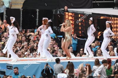 https___www_shutterstock_com_editorial_image-editorial_M4TdQ027Nez3g332Mjc5NTE3D_perrie-performing-on-stage-capital_s-summertime-ball-1500w-14539554jw.jpg