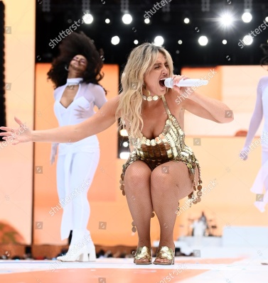 https___www_shutterstock_com_editorial_image-editorial_M8T7Qf29N1z7g93aMTYwOTI3D_perrie-performing-on-stage-capital_s-summertime-ball-1500w-14539542np.jpg