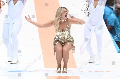 https___www_shutterstock_com_editorial_image-editorial_MdTeQ32eN1z1g83cMjc5NjI3D_perrie-performing-on-stage-capital_s-summertime-ball-1500w-14539554ka.jpg