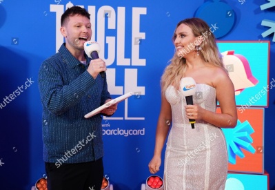 https___www_shutterstock_com_editorial_image-editorial_MfTcU4xeM6j6I238Njg1MjY3D_perrie-talks-alex-oxlaide-chamberlain-on-tablet-backstage-1500w-14977322dm.jpg