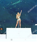 https___www_shutterstock_com_editorial_image-editorial_M1T2Qd20N2z1gd3fNDQ2Mzc3D_perrie-performing-on-stage-capital_s-summertime-ball-1500w-14539553zc.jpg