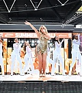 https___www_shutterstock_com_editorial_image-editorial_M4T3Q422N6zdg938NDQ4NDA3D_perrie-performing-on-stage-capital_s-summertime-ball-1500w-14539553zp.jpg