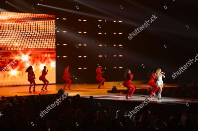 https___www_shutterstock_com_editorial_image-editorial_M2T0U1xfMdj5Ia36OTU3MDE3D_perrie-performing-on-stage-capital_s-jingle-bell-1500w-14977343ef.jpg