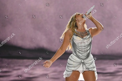 https___www_shutterstock_com_editorial_image-editorial_McTaUax7M0jaIb39OTUxNDk3D_perrie-performing-on-stage-capital_s-jingle-bell-1500w-14977343dp.jpg